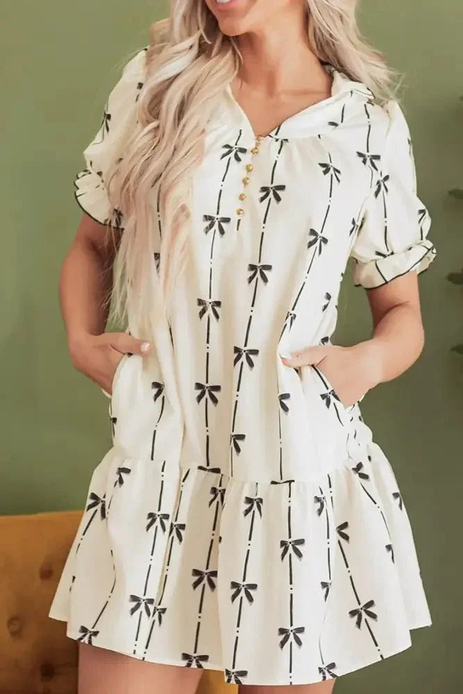 Frill Bow Print Notched Short Sleeve Mini Dress - Update AvenueVacation StyleTrendsi100100896981808100100896981808f18f0763 - b9f0 - 4d6a - a0fd - dac07fd354f5 - MaxCream