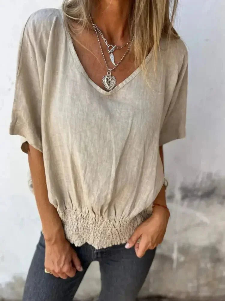 Full Size Smocked Hem V - Neck Relaxed Fit T-Shirt Plus Size - Update AvenueT-ShirtsTrendsi100100055121359100100055121359ecc489b8 - 61d1 - 4c35 - 9f0a - a9e04ae460f6 - Max - OriginBeige