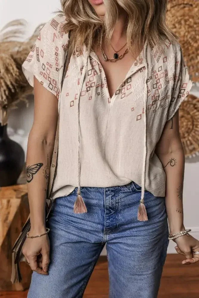 Geometric Embroidered Short Sleeve Tassel Tie Neck Blouse - Update AvenueBoho VibesTrendsi100100460208597100100460208597a08f1974 - 38df - 49d1 - bfd3 - 5c10a681b54e - Max - OriginBeige