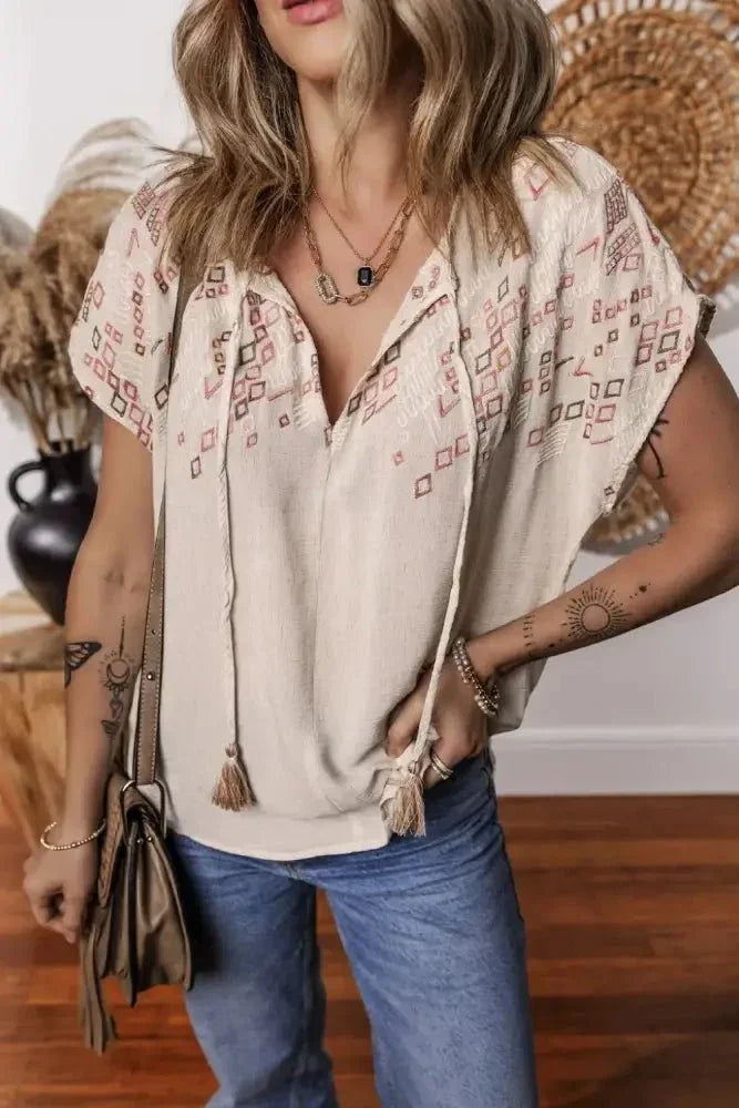 Geometric Embroidered Short Sleeve Tassel Tie Neck Blouse - Update AvenueBoho VibesTrendsi100100460208597100100460208597cddb899f - c0d3 - 4742 - 9ec2 - 800a0fedeb3e - Max - OriginBeige