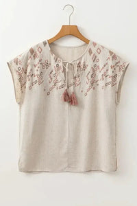Geometric Embroidered Short Sleeve Tassel Tie Neck Blouse - Update AvenueBoho VibesTrendsi1001004602085971001004602085973f6b1c36 - 84d6 - 4488 - a98f - 483f6f34fc59 - Max - OriginBeige