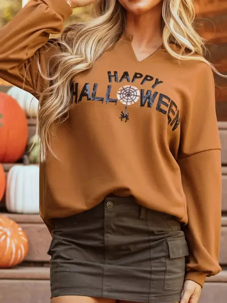 Happy Halloween Graphic Notched Long Sleeve Loose Top - Update AvenueHalloweenTrendsi100100101611597100100101611597e093583e - 6a10 - 451c - a2de - 52f269545eb0 - Max - OriginTerracotta