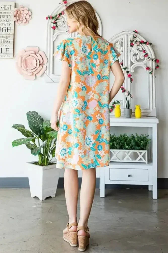 Heimish Full Size Ruffled Short Sleeve Floral Mini Dress Plus Size - Update AvenueVacation StyleTrendsi100100529431338100100529431338f365f274 - caf9 - 4e19 - 9efd - eeff13245ec4 - MaxOrange