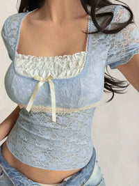 Lace Short Sleeve T-Shirt with Bow Detail - Update AvenueT-ShirtsTrendsi1001008156133191001008156133195af21923 - 4b21 - 4dbe - 887e - 305d265adbaf - Max - OriginLight Blue