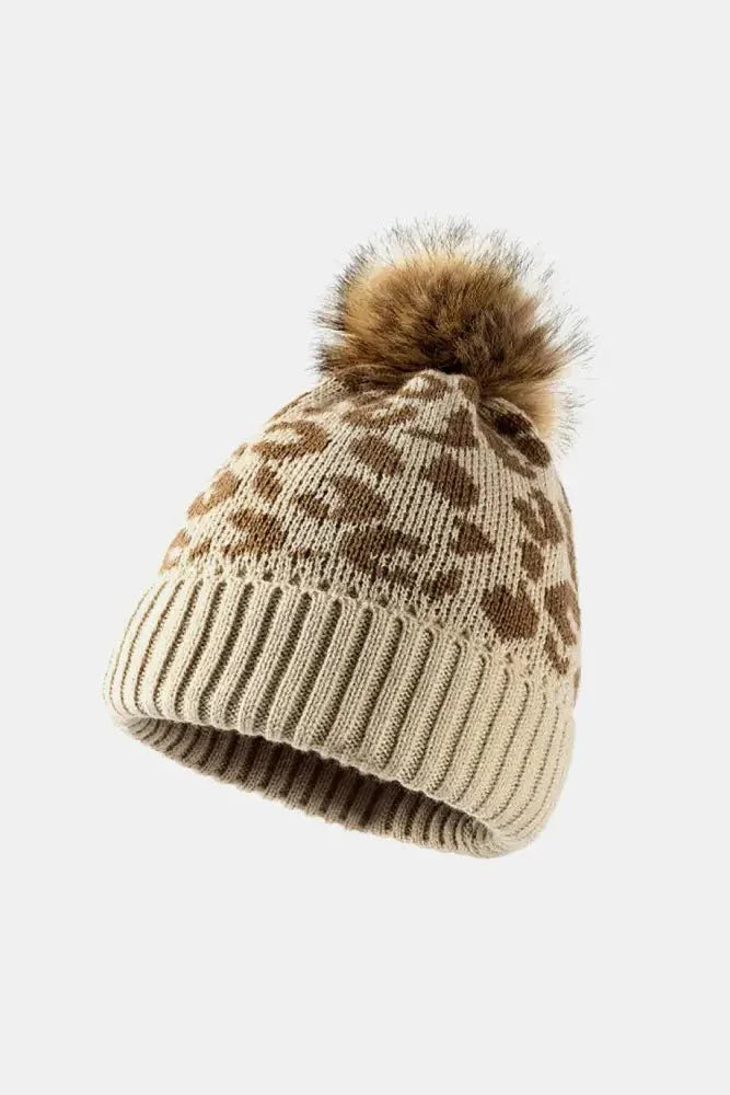 Leopard Pom - Pom Cuffed Beanie - Update AvenueTrendsi100100598491559100100598491559Leopard Pom - Pom Cuffed BeanieBeige
