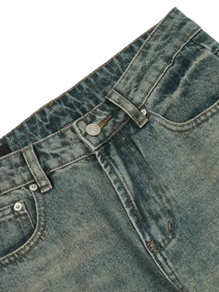 Washed-out blue distressed straight leg jeans with button closure and front pockets