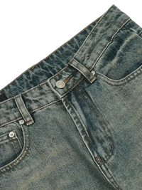 Washed-out blue distressed straight leg jeans with button closure and front pockets