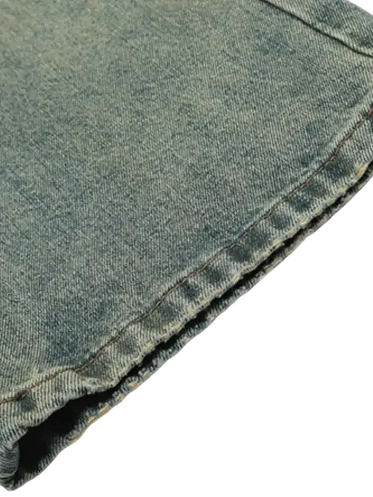 Faded light blue distressed straight leg jeans with visible hem for men’s fashion