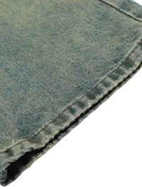 Faded light blue distressed straight leg jeans with visible hem for men’s fashion