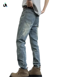Light blue denim slim fit jeans with white lightning bolt designs for men in plus size