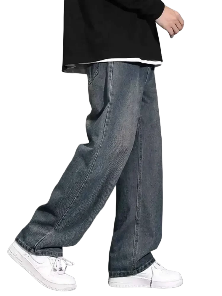 Loose-fitting faded blue jeans with a wide leg, available in size wide leg plus size
