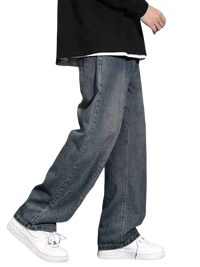 Loose-fitting faded blue jeans with a wide leg, available in size wide leg plus size