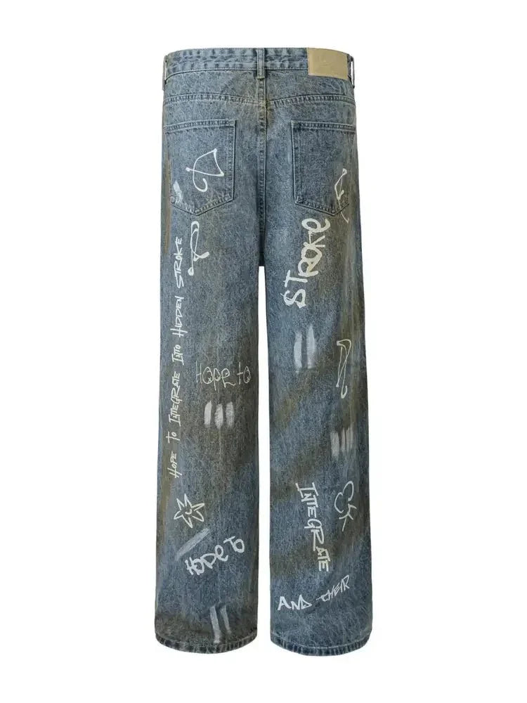 Men's Graffiti Art Loose Fit Jeans - Update AvenueTrendsi100400797334067100400797334067Men's Graffiti Art Loose Fit JeansWashed Blue