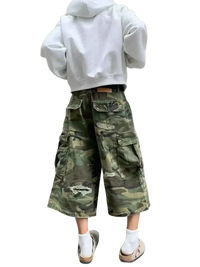 White hooded sweatshirt with distressed camouflage cargo capris in plus size distressed fashion