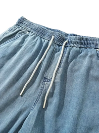 Light-wash blue denim plus size drawstring shorts with elastic waistband for men