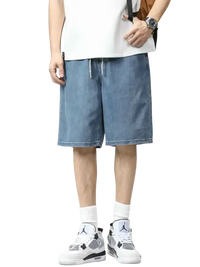 Light blue plus size drawstring denim shorts with a loose fit and adjustable waist