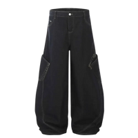 Black wide leg cargo pants with white contrast stitching, ideal for men’s wide leg cargo jeans