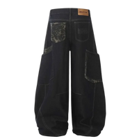 Black denim wide leg cargo jeans with patterned pockets and a brown brand patch