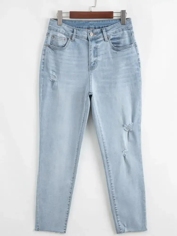 Mid Rise Ankle-Length Distressed Skinny Jeans