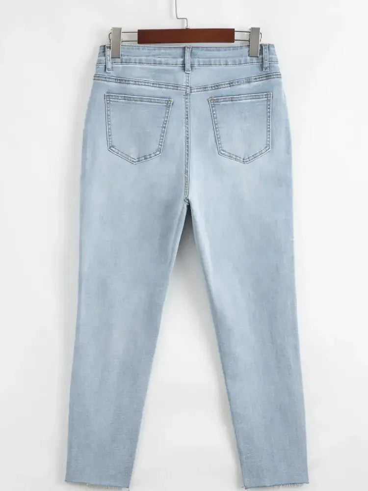 Mid Rise Ankle-Length Distressed Skinny Jeans