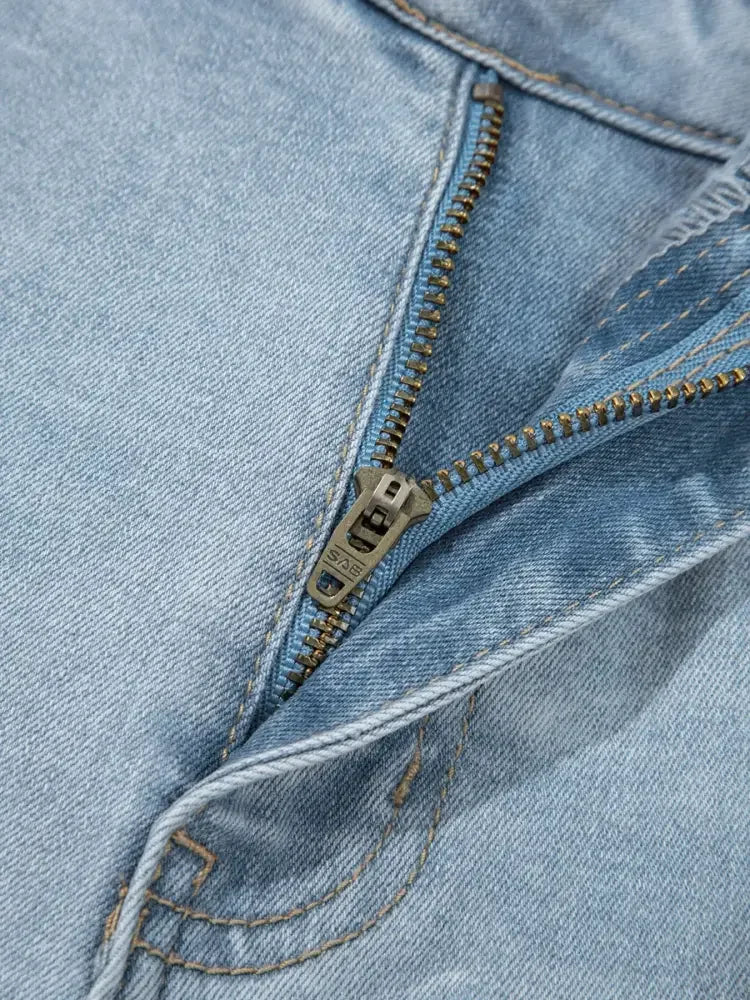 Mid Rise Ankle-Length Distressed Skinny Jeans