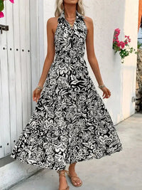 Perfee Backless Smocked Printed Sleeveless Midi Dress - Update AvenueBoho VibesTrendsi100100911371903100100911371903558fb375 - bb43 - 4c09 - bd2b - 0a9e7c11579b - MaxBlack