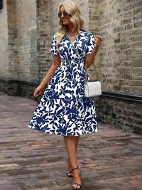 Printed Smocked Surplice Short Sleeve Dress - Update AvenueEffortless Elegance: DressesTrendsi1001004087546201001004087546200c66cc12 - b046 - 4c3a - b1fa - 11c0c0b35c95 - MaxPeacock Blue