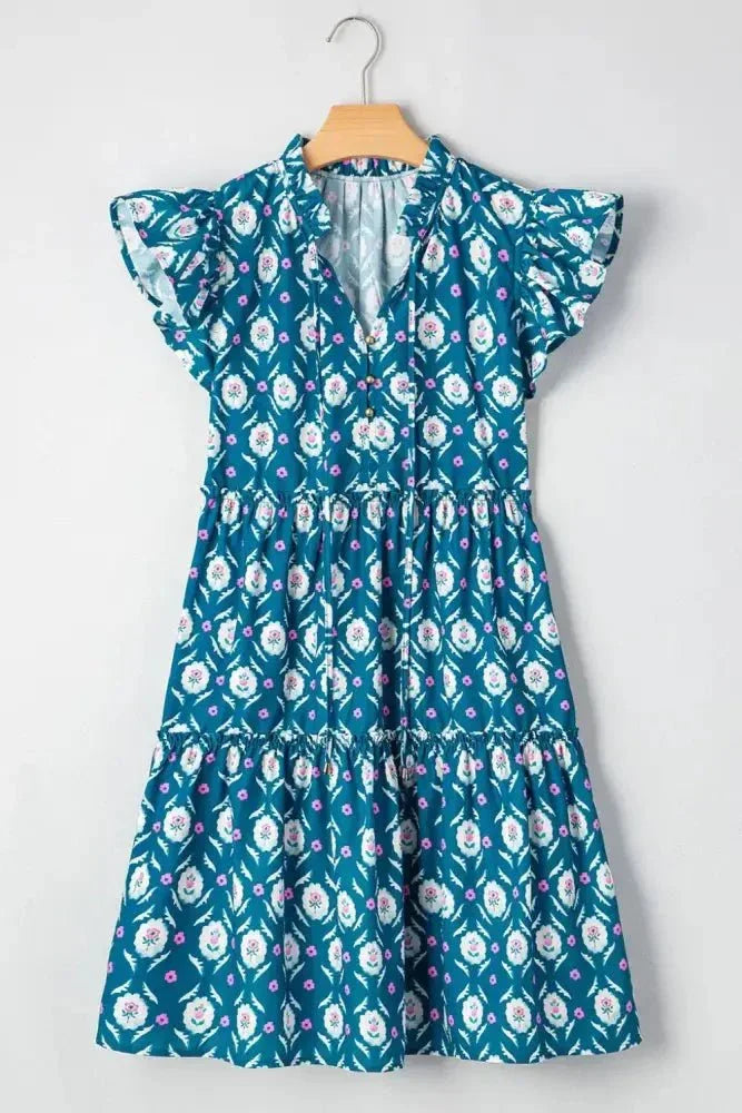 Printed Tie Neck Ruffled Cap Sleeve Dress - Update AvenueEffortless Elegance: DressesTrendsi10010009774437010010009774437043c09ad0 - d2c6 - 498a - b426 - 17f6f98a677e - Max - OriginFloral