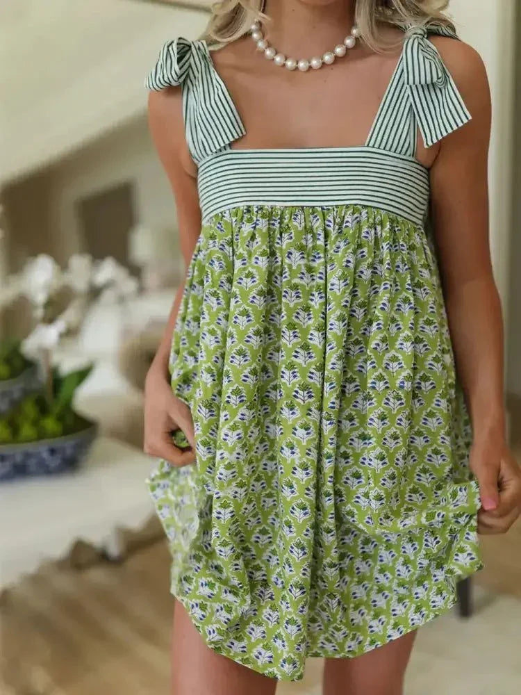 Printed Tie Shoulder Mini Cami Dress - Update AvenueEffortless Elegance: DressesTrendsi1001000998316531001000998316534825fd24 - 085f - 4818 - aebb - 105b785e2903 - MaxGum Leaf