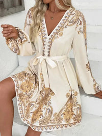 Printed Tie Waist Long Sleeve Dress - Update AvenueCasual DressesTrendsi100100260361446100100260361446Printed Tie Waist Long Sleeve DressBeige