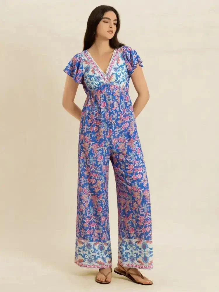 Printed V - Neck Wide Leg Jumpsuit - Update AvenueBoho VibesTrendsi10010054260120310010054260120323020e29 - f53b - 4b1e - 88ad - ed65a369d826 - Max - OriginBlue Purple