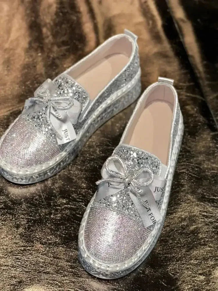 Rhinestone Bow Round Toe Slip - Ons - Update AvenueTrendsi100600541617623100600541617623Rhinestone Bow Round Toe Slip - OnsSilver