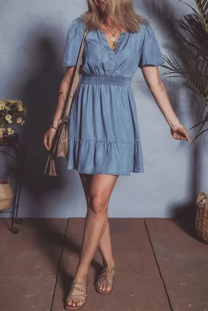 Ruffled Hem Smocked Flutter Sleeve Denim Mini Dress - Update AvenueDenim Dresses & SkirtsTrendsi1001006630418671001006630418673861e7a7 - 5057 - 4e56 - a27e - 30ea69d8a42a - MaxDusty Blue