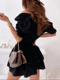 Ruffled Smocked Layered Mini Dress - Update AvenueEffortless Elegance: DressesTrendsi10010037621568210010037621568278d341bb - c8fd - 438d - 801d - 9bec09999e51 - Max - OriginBlack
