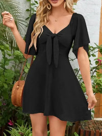 Smocked Back Knotted Flutter Sleeve Dress - Update AvenueEffortless Elegance: DressesTrendsi100100009891318100100009891318ddaecf81 - 7bb4 - 414e - 8363 - 2e4c7d82a68d - Max - OriginBlack