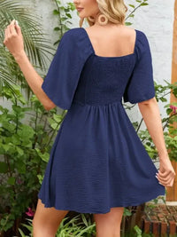 Smocked Back Knotted Flutter Sleeve Dress - Update AvenueEffortless Elegance: DressesTrendsi100100009891740100100009891740f9f86fa2 - 905f - 472f - 88d7 - 1d48cfc7a1e8 - Max - OriginDark Blue