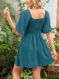 Smocked Back Knotted Flutter Sleeve Dress - Update AvenueEffortless Elegance: DressesTrendsi10010000989215810010000989215890acbac3 - 317c - 42a7 - bffe - b0b692b2ee56 - Max - OriginDeep Teal