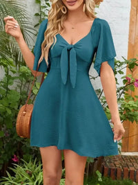 Smocked Back Knotted Flutter Sleeve Dress - Update AvenueEffortless Elegance: DressesTrendsi100100009892158100100009892158bf215fe3 - baa5 - 4fef - aa89 - 0319e7a079de - Max - OriginDeep Teal