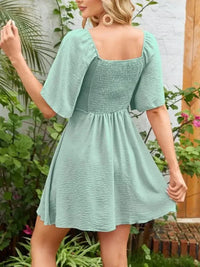 Smocked Back Knotted Flutter Sleeve Dress - Update AvenueEffortless Elegance: DressesTrendsi1001000098929681001000098929687d5596ba - d248 - 4170 - 92b1 - 260f6cbf4d44 - Max - OriginGum Leaf