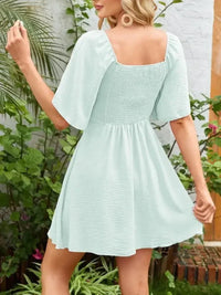 Smocked Back Knotted Flutter Sleeve Dress - Update AvenueEffortless Elegance: DressesTrendsi100100009893306100100009893306a3d36d94 - 7956 - 41ff - 8ff3 - 043e8fc7731f - Max - OriginLight Green