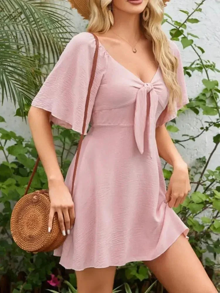 Smocked Back Knotted Flutter Sleeve Dress - Update AvenueEffortless Elegance: DressesTrendsi100100009895376100100009895376808c442f - 4d51 - 47af - bf73 - 838cc8f9c871 - Max - OriginBlush Pink