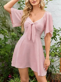 Smocked Back Knotted Flutter Sleeve Dress - Update AvenueEffortless Elegance: DressesTrendsi100100009895376100100009895376f27197ab - 24de - 418d - 9cad - 5f1ef73cb710 - Max - OriginBlush Pink