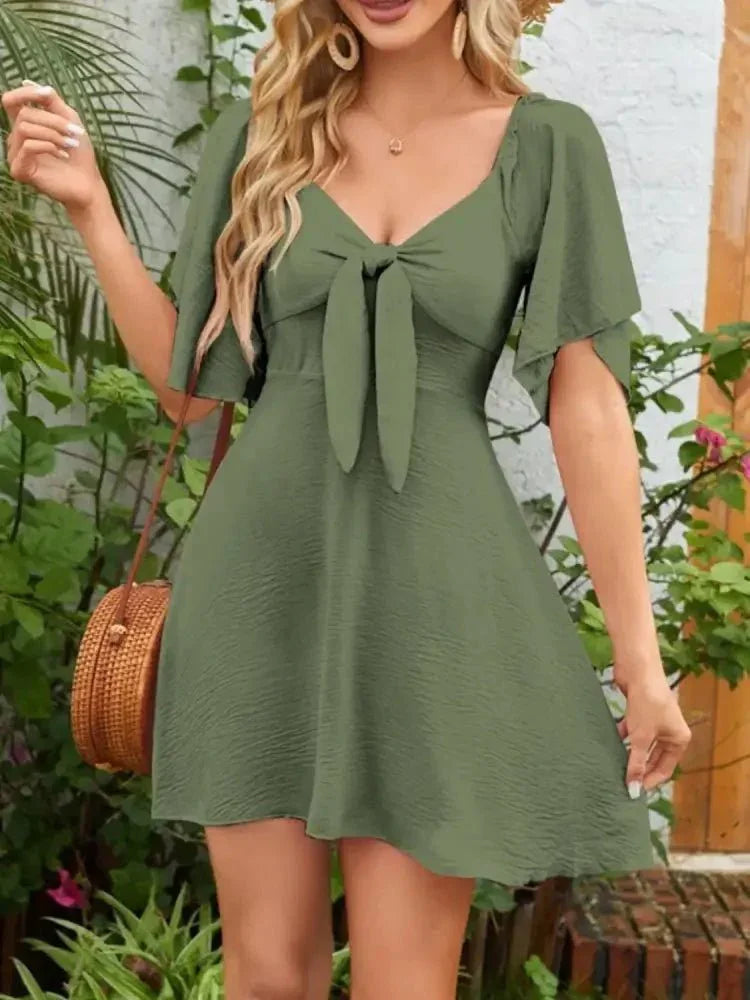Smocked Back Knotted Flutter Sleeve Dress - Update AvenueEffortless Elegance: DressesTrendsi1001000098996821001000098996821e8cccb2 - c2cd - 4aa1 - af38 - 33f9d0e0f96c - Max - OriginMoss