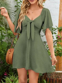 Smocked Back Knotted Flutter Sleeve Dress - Update AvenueEffortless Elegance: DressesTrendsi1001000098996821001000098996821e8cccb2 - c2cd - 4aa1 - af38 - 33f9d0e0f96c - Max - OriginMoss