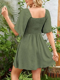 Smocked Back Knotted Flutter Sleeve Dress - Update AvenueEffortless Elegance: DressesTrendsi10010000989968210010000989968213a46673 - a4c6 - 40b2 - abed - fe6f5d673454 - Max - OriginMoss