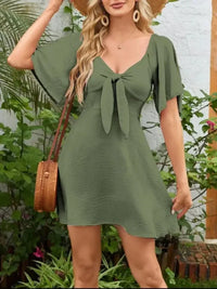Smocked Back Knotted Flutter Sleeve Dress - Update AvenueEffortless Elegance: DressesTrendsi100100009899682100100009899682d51592e3 - 6457 - 458c - 9efb - d9d1cda61b3b - Max - OriginMoss