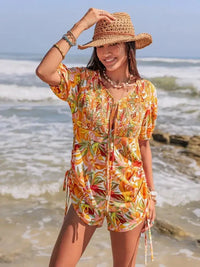 Smocked Printed Tie Neck Romper - Update AvenueBoho VibesTrendsi10010006823180410010006823180495e18a20 - 4bd1 - 4944 - 800e - 444fd9c40e98 - Max - OriginTangerine