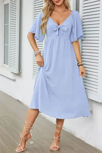 Smocked Tie Front Flutter Sleeve Midi Dress - Update AvenueEffortless Elegance: DressesTrendsi10010029069117310010029069117352f06dd0 - d1b8 - 49af - bf71 - 74d60efb86b5 - Max - OriginLight Blue
