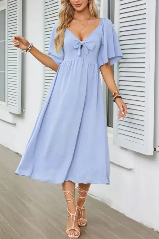 Smocked Tie Front Flutter Sleeve Midi Dress - Update AvenueEffortless Elegance: DressesTrendsi100100290691173100100290691173d3b47789 - b62f - 45c8 - ad61 - 453eb8035d99 - Max - OriginLight Blue