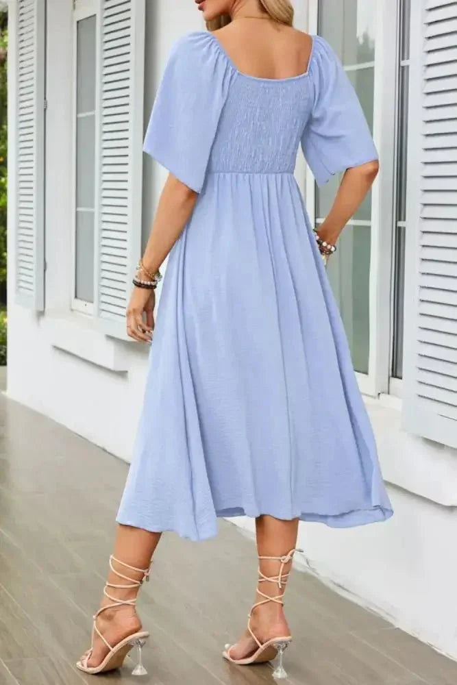 Smocked Tie Front Flutter Sleeve Midi Dress - Update AvenueEffortless Elegance: DressesTrendsi100100290691173100100290691173e8adf057 - ebe5 - 40c7 - 900a - 92ecad857d81 - Max - OriginLight Blue